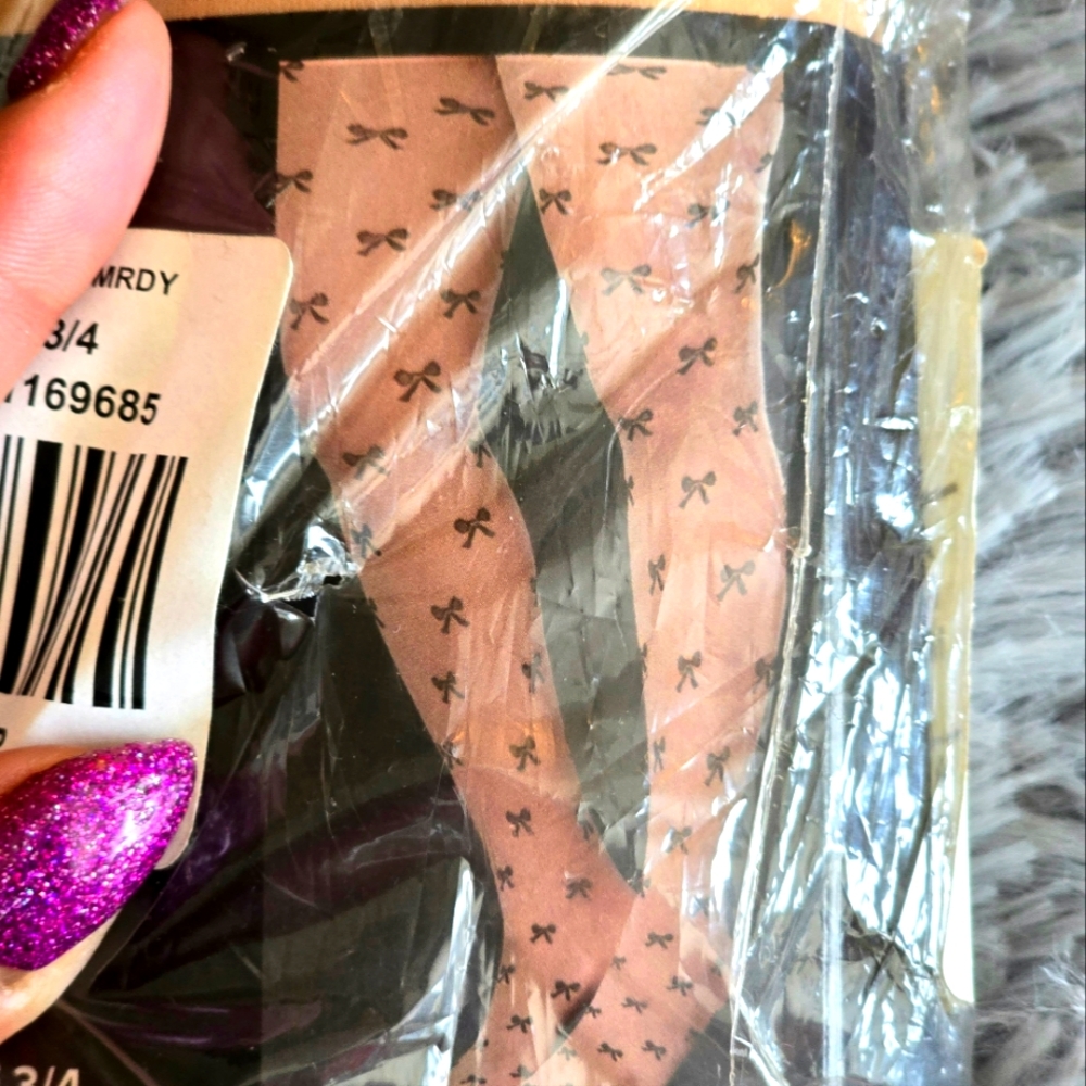 Brand new- Never worn-Bow Tie Pantyhose